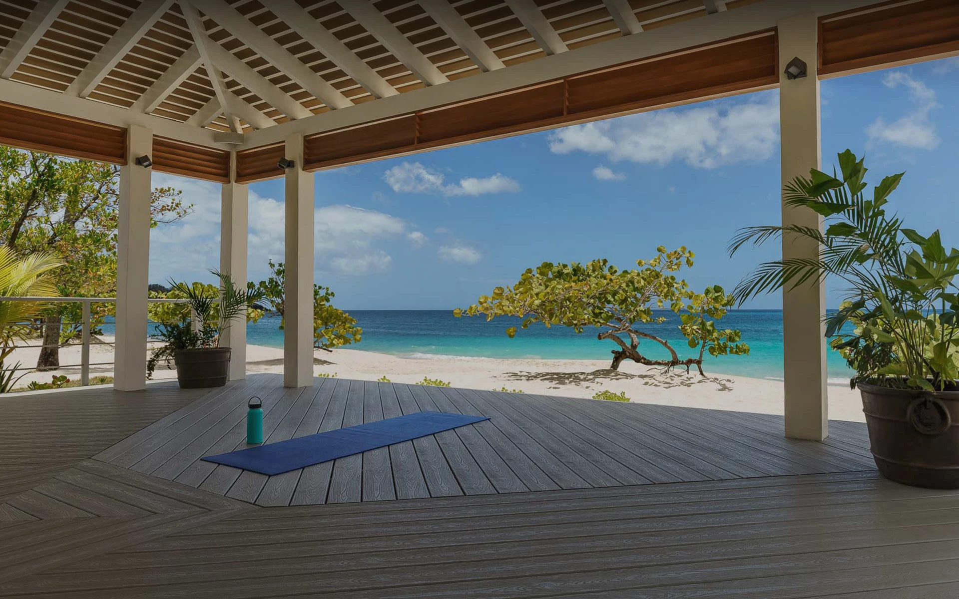 Yoga mat on a pavilion overlooking the beach